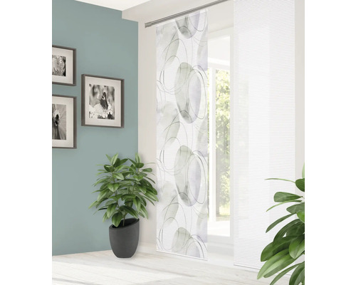 Panneau coulissant décoratif avec motif de cercles devant la fenêtre