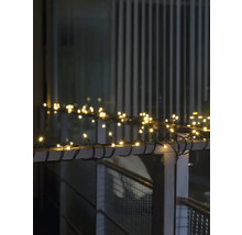 Guirlande lumineuse avec LED blanc chaud fixée à une balustrade