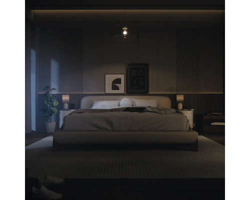 Chambre à coucher avec lit, tables de chevet et décoration