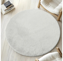 Tapis rond et doux dans un intérieur