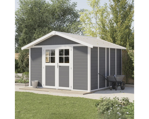 Abri de jardin avec double porte et toit à deux versants dans le jardin