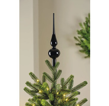 Schwarze Christbaumspitze auf einem Weihnachtsbaum