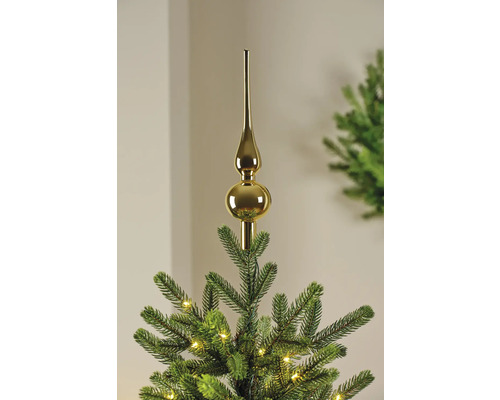 Goldfarbener Christbaumspitz auf einem Weihnachtsbaum
