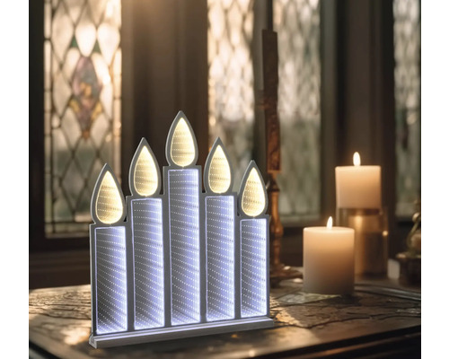 Lampe à bougies LED décorative avec cinq bougies sur la table