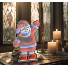 Figurine LED décorative de Père Noël sur une table