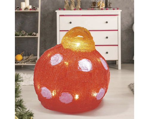 Dekorative rote Weihnachtskugel mit Punkten für den Innenbereich