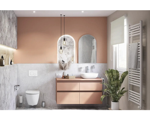 Modernes Badezimmer mit Waschtisch, Spiegel, Toilette und Heizkörper