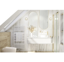 Salle de bain lumineuse avec meuble-lavabo, miroir, radiateur et toilettes sous une pente de toit