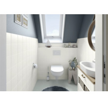 Salle de bains moderne avec fenêtre de toit, meuble sous-lavabo et toilettes