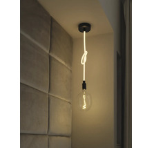 Hängelampe mit Knoten und Glühbirne im modernen Interieur