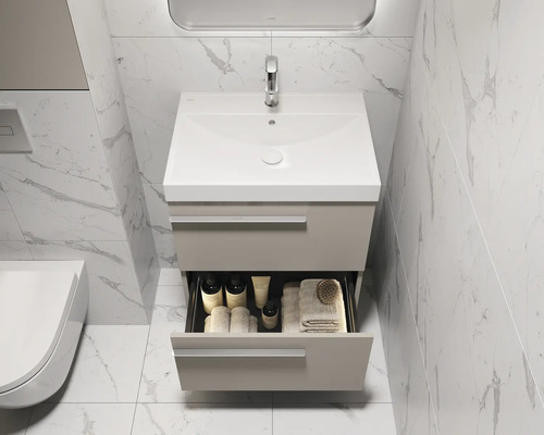 Salle de bains avec meuble sous-lavabo, tiroir ouvert et lavabo blanc