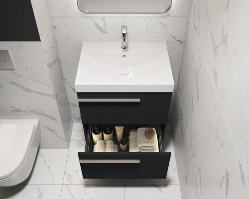 Meuble-lavabo avec tiroir ouvert dans une salle de bains