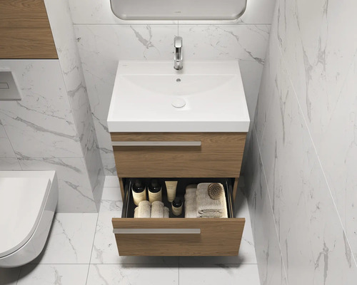 Meuble sous-lavabo avec tiroir ouvert et lavabo dans une salle de bain