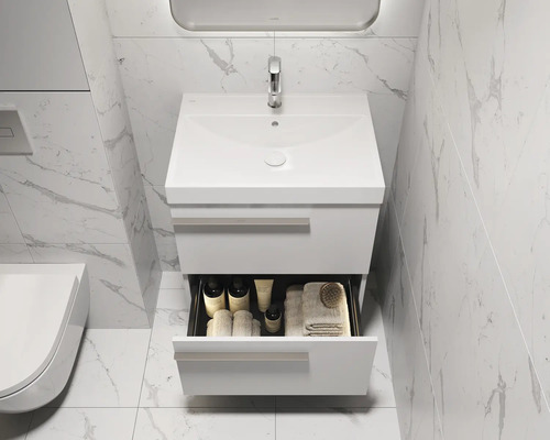 Salle de bain moderne avec meuble sous-vasque, tiroir ouvert et carrelage en marbre