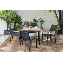 Ensemble de sièges de jardin avec table en bois et quatre chaises sur une terrasse en bois