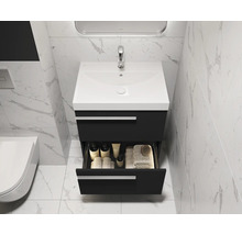 Modernes Badezimmer mit Waschbeckenunterschrank, Waschtisch, Armatur und offenem Schubfach für Badutensilien