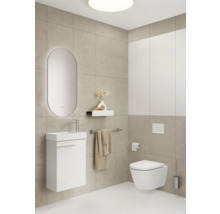 Salle de bains moderne avec lavabo, toilettes, miroir et carrelage