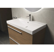 Meuble sous-lavabo avec lavabo et robinet dans la salle de bain