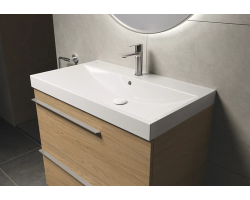 Meuble-lavabo avec meuble bas en bois clair et lavabo moderne