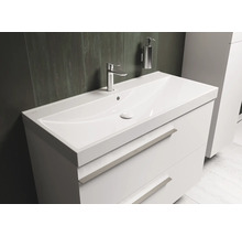 Meuble sous-vasque blanc avec lavabo, robinet et distributeur de savon