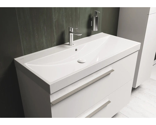 Meuble sous-vasque blanc avec lavabo, robinet et distributeur de savon