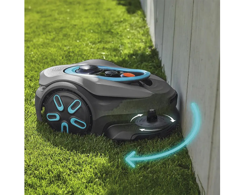 Robot tondeuse coupant les bordures sur une pelouse