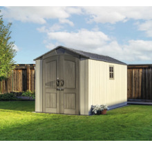 Abri de jardin avec double porte et fenêtre dans le jardin