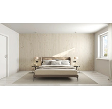 Chambre à coucher avec lit double, tables de chevet et lambris en bois