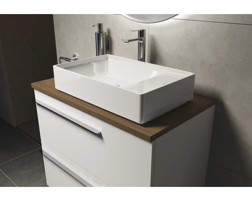 Meuble-lavabo avec vasque à poser et meuble sous-vasque dans la salle de bains.