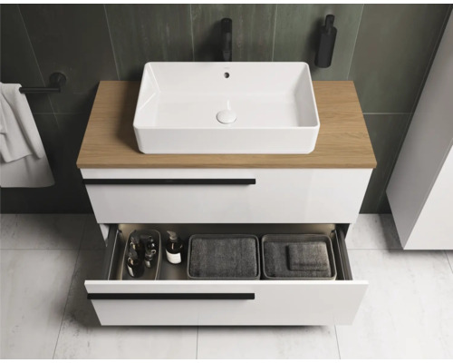 Salle de bains avec meuble sous-lavabo, vasque à poser et tiroir ouvert