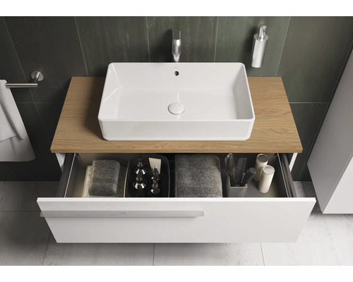 Meuble-lavabo avec vasque, tiroir et étagère dans la salle de bains