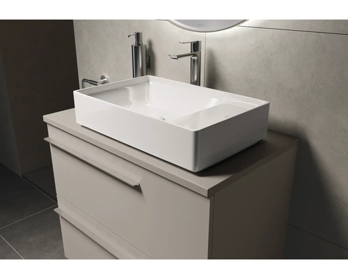 Salle de bain moderne avec vasque à poser, meuble sous-vasque, robinet et distributeur de savon
