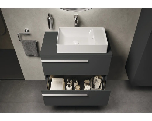 Salle de bains moderne avec meuble sous-lavabo, tiroir ouvert et vasque à poser