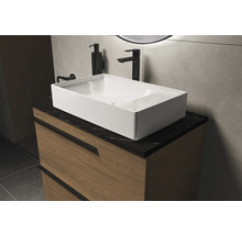 Meuble-lavabo avec armoire, vasque à poser, robinet et distributeur de savon dans la salle de bains