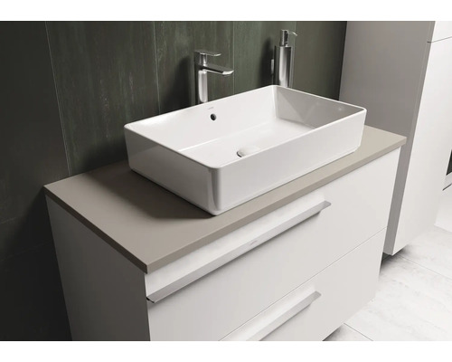 Salle de bains avec lavabo à poser sur un meuble sous-vasque