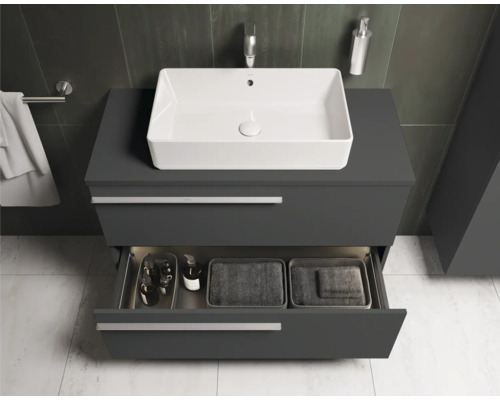 Salle de bain avec meuble sous-lavabo moderne, vasque à poser et tiroir ouvert