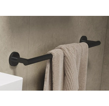Porte-serviettes noir avec serviette sur le mur