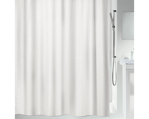 Rideau de douche blanc à motif gaufré dans salle de bain