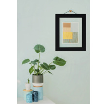 Plante d'intérieur décorative avec cadre photo au mur