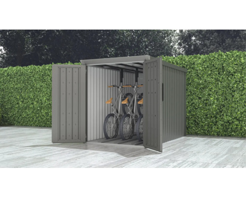 Garage à vélos avec portes ouvertes et vélos à l'intérieur