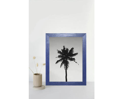 Blauer Bilderrahmen mit Schwarzweiß-Palmenmotiv