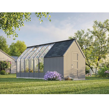 Serre avec façade en verre et porte en bois dans le jardin.