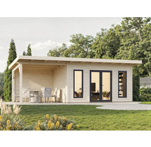 Abri de jardin avec terrasse et salon de jardin.