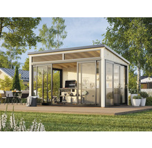 Maison de jardin moderne avec portes coulissantes et espace barbecue à l'extérieur.