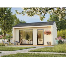 Abri de jardin avec porte coulissante et terrasse attenante dans le jardin.