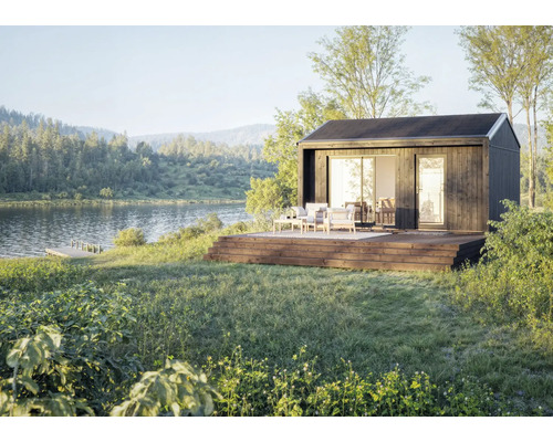 Maison de jardin modulaire avec terrasse en bois au bord du lac