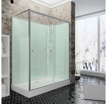 Cabine de douche spacieuse avec douchette à main et fond carrelé dans une salle de bains lumineuse.