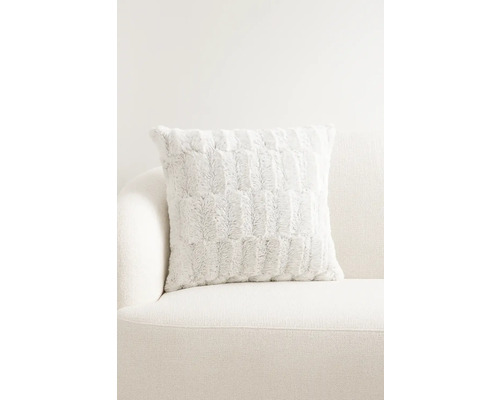 Coussin décoratif à motif sur un canapé