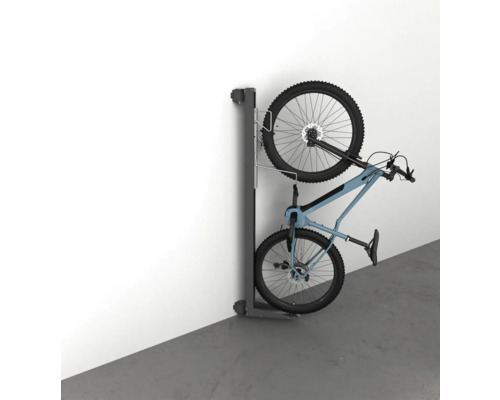 Ascenseur à vélos avec deux vélos montés sur un mur