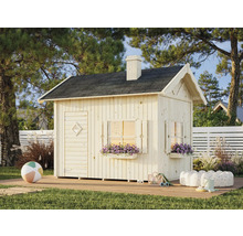 Cabane de jeu en bois avec toit et volets dans le jardin